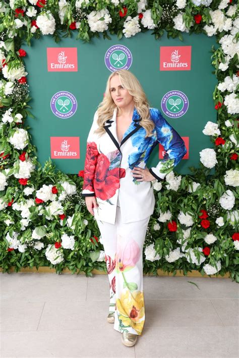 Rebel Wilson Dazzles in Metallic YSL Espadrilles at Wimbledon .